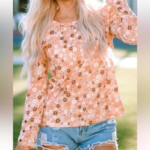 Long sleeve floral knit top.